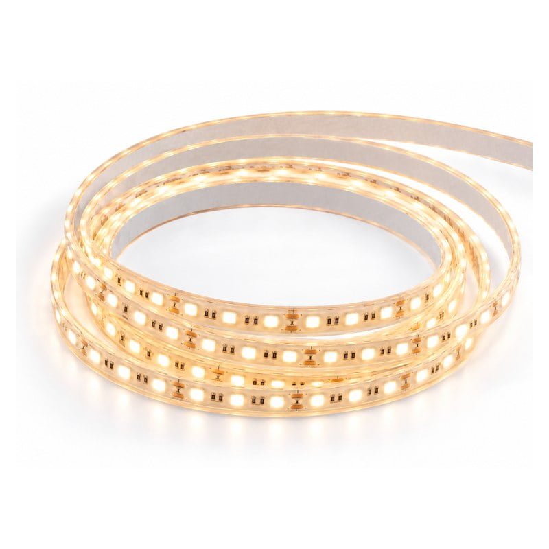 Coiled flexible LED strip light with warm white LEDs glowing along the copper-toned ribbon.