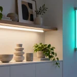 Separate white task lighting and a colored tubular accent in a commercial interior
