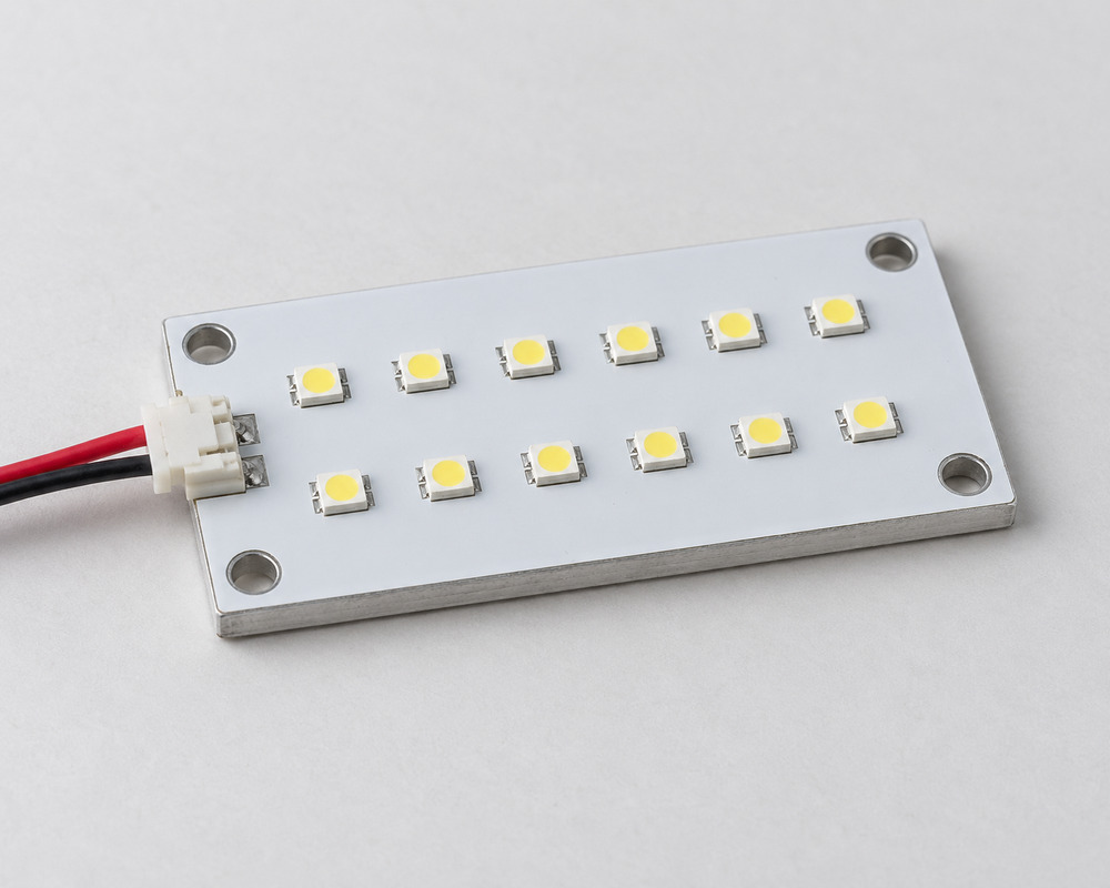 Custom LED module concept showing a rectangular white board, two LED rows, mounting holes and a two-wire connector