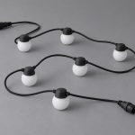 Custom LED string lights concept with opal nodes, black cable and end connectors