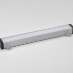 Embedded LED lighting concept with a silver linear profile, white cover, dark end caps, mounting tabs and an end cable