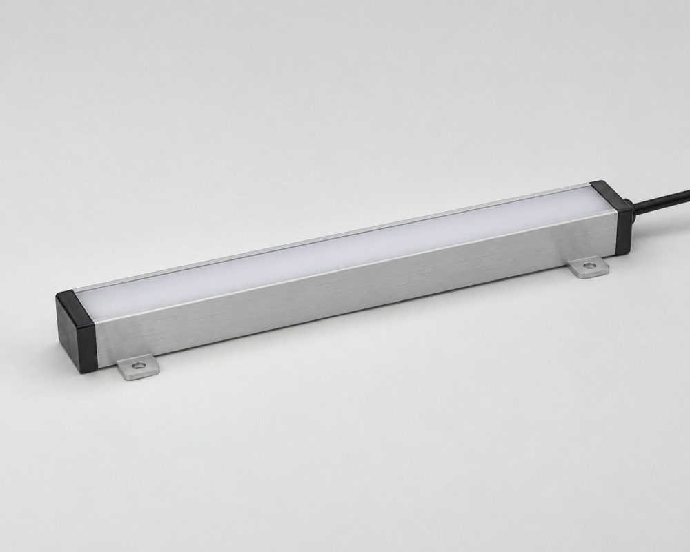 Embedded LED lighting concept with a silver linear profile, white cover, dark end caps, mounting tabs and an end cable