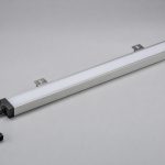 Train interior lights concept with an enclosed linear profile, diffuser, mounting tabs, and keyed lead