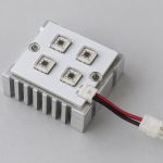 UVC LED module concept showing four emitter packages on a square heat sink with a protected lead